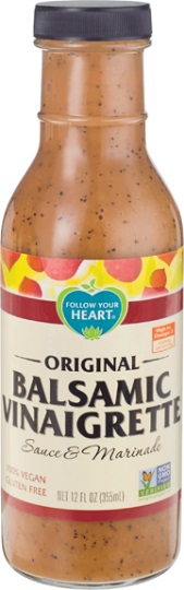 photo of organic vegan balsamic vinaigrette by follow your heart in glass jar with plastic screw on cap packaging with a cream, maroon, and blue paper label
