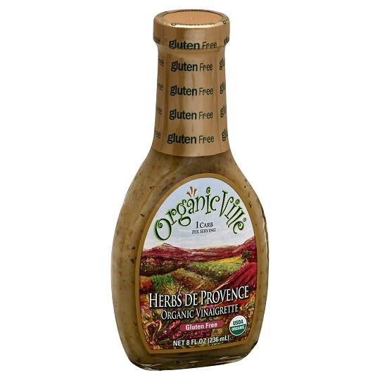 photo of organic vegan herbs de provence dressing by organic ville brand packaged in glass bottle with screw on cap with colorful paper label